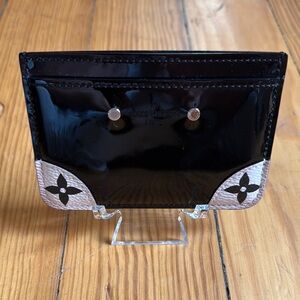 Authentic Louis Vuitton Black and White Card Holder-in excellent condition.